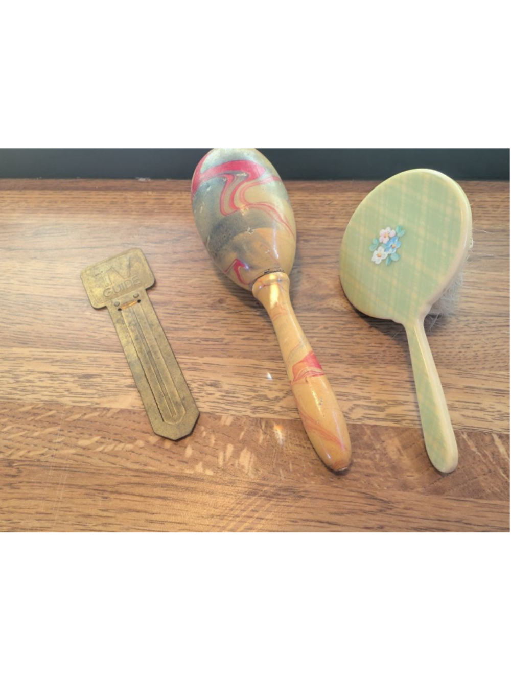 Vintage Collectibles trio featuring a vintage brush with celluloid handle
